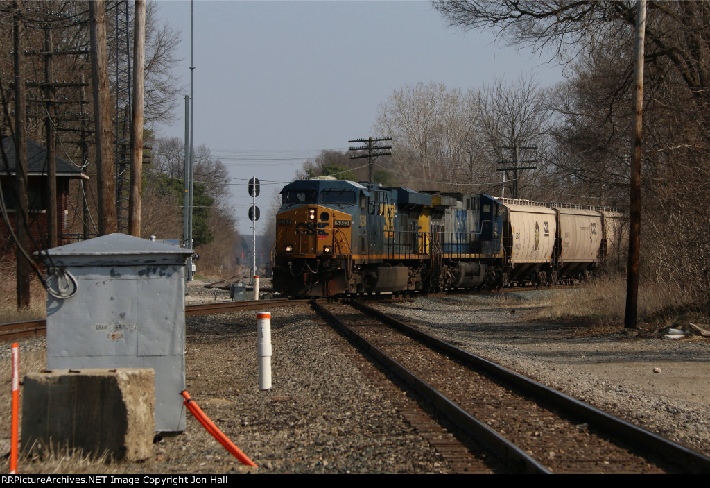 Y117 crosses the diamond northward with grain empties